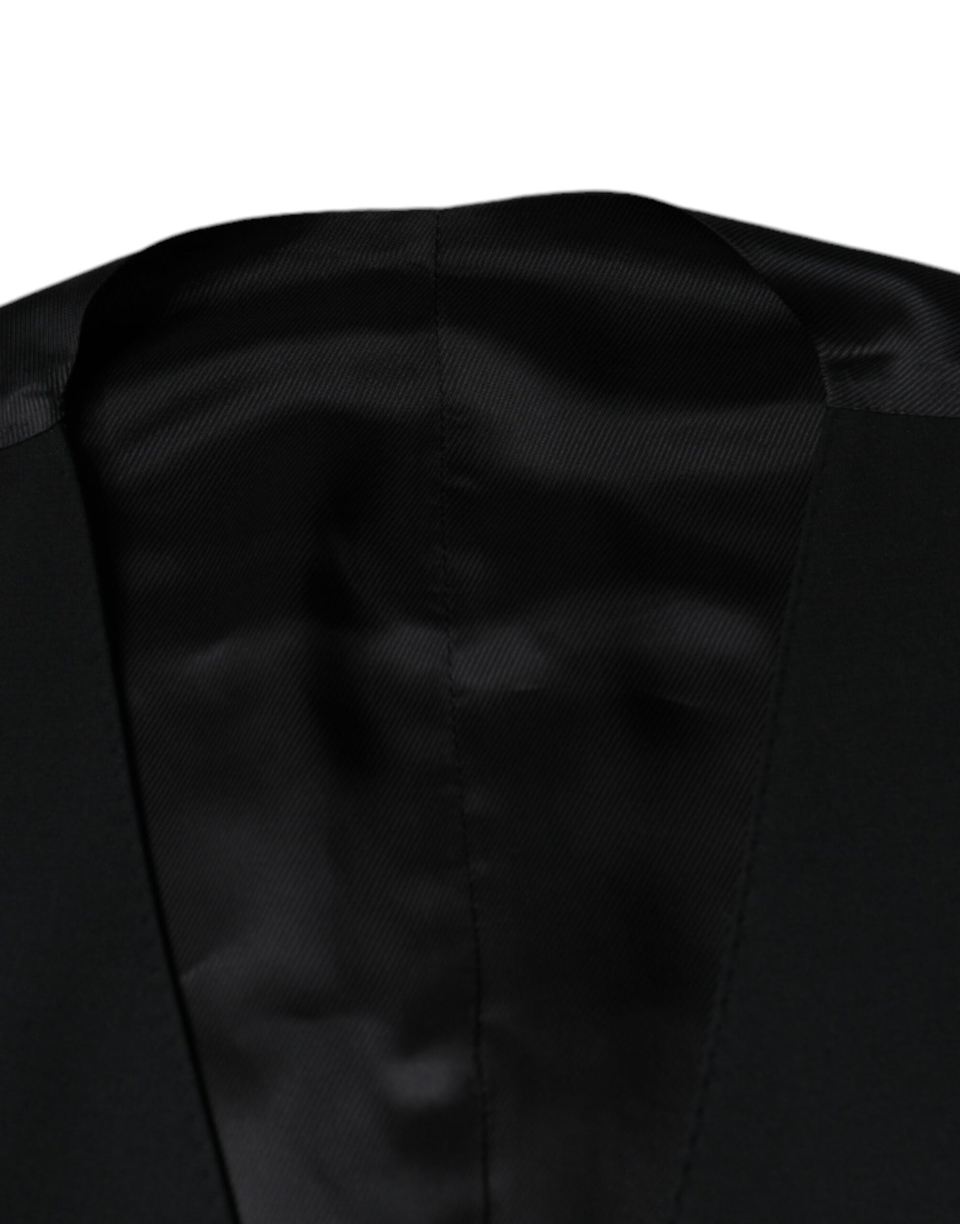 A black wool vest from Dolce & Gabbana, part of a formal men's suit