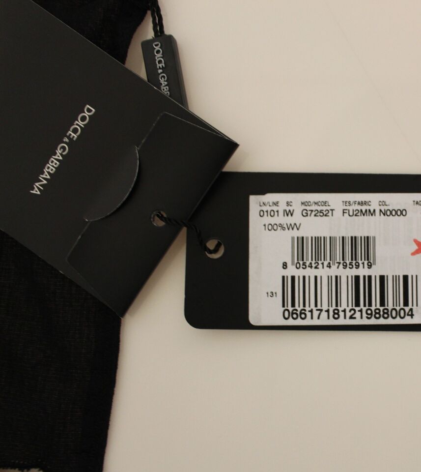 A black wool vest from Dolce & Gabbana, part of a formal dress collection
