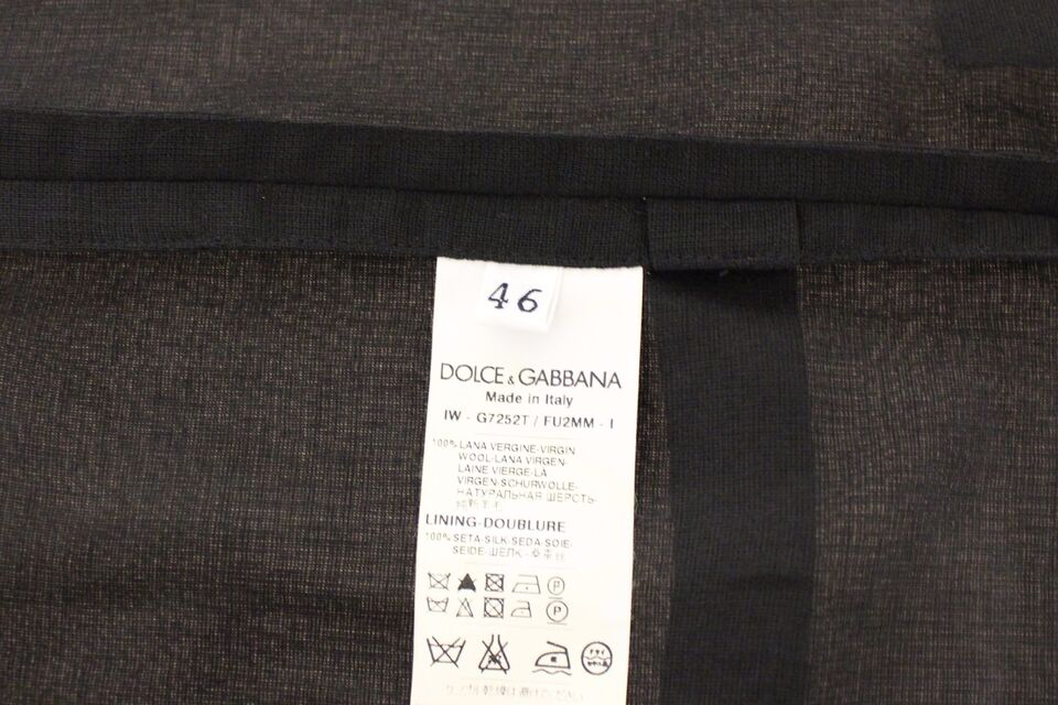 A black wool vest from Dolce & Gabbana, part of a formal dress ensemble