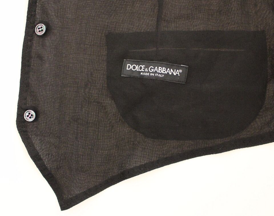 A black wool vest from Dolce & Gabbana, featuring a label on the left chest