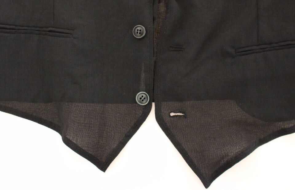 A black wool vest jacket with two visible buttons and a zipper