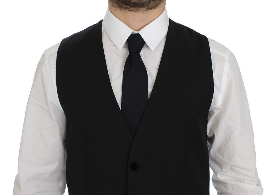 A black wool vest with a notched collar, worn by a mannequin