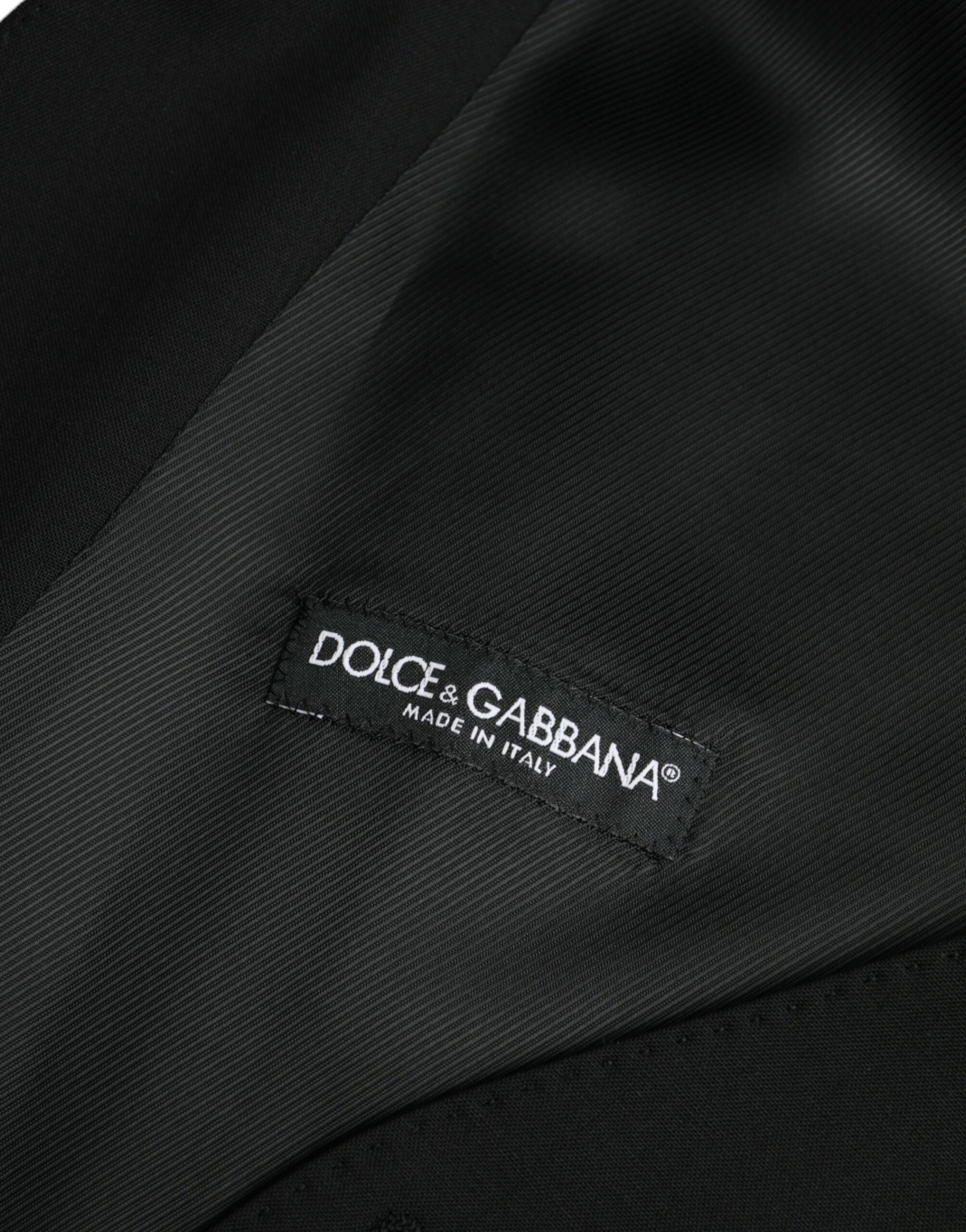 A black wool vest from Dolce & Gabbana, featuring the brand's logo on the left chest