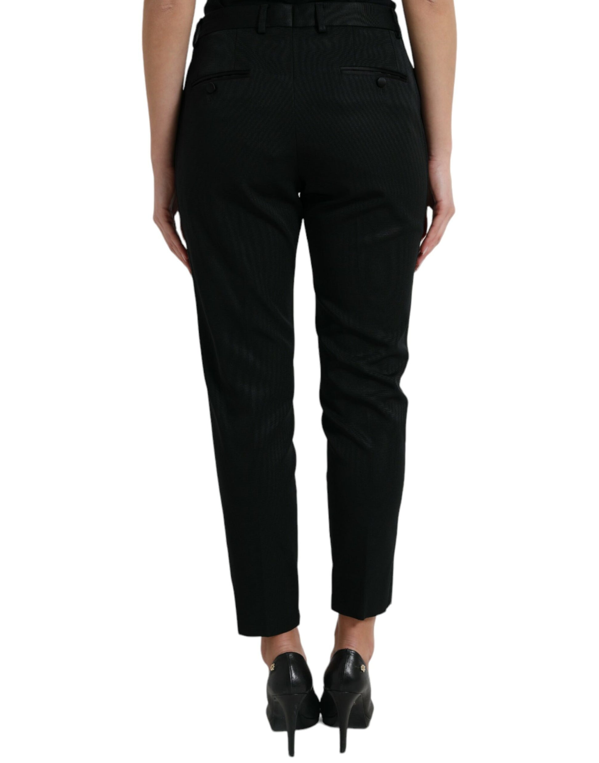 Pair of black trousers with a high waist and wide legs