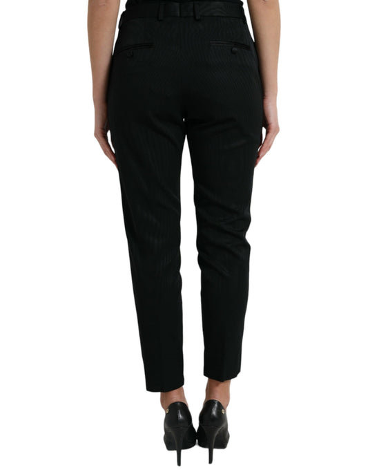 Pair of black trousers with a high waist and wide legs
