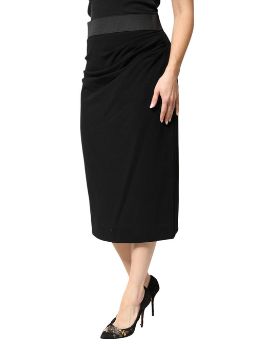 Black skirt with horizontal stripes worn by a woman standing against white background
