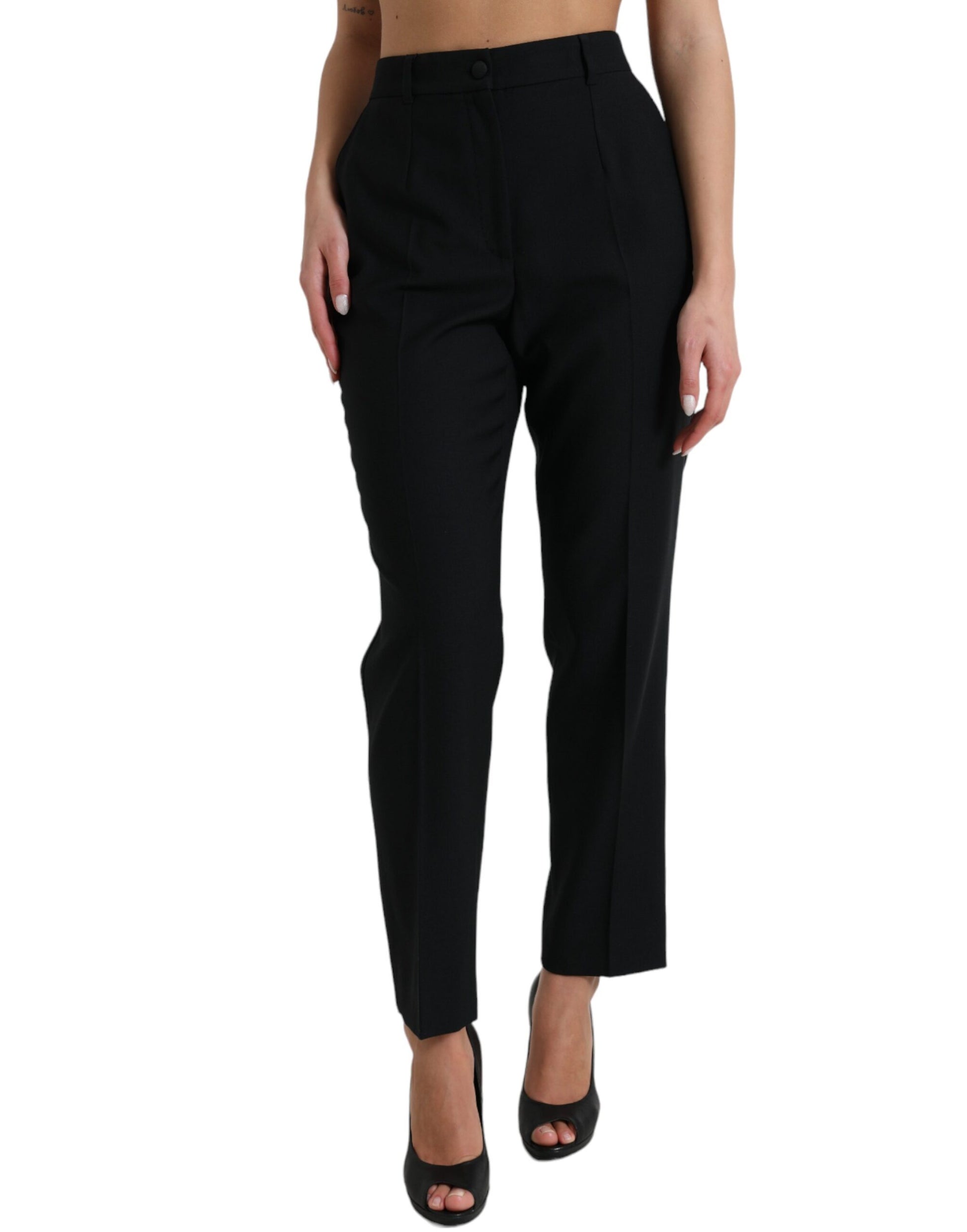 Pair of black trousers with high waist and wide legs
