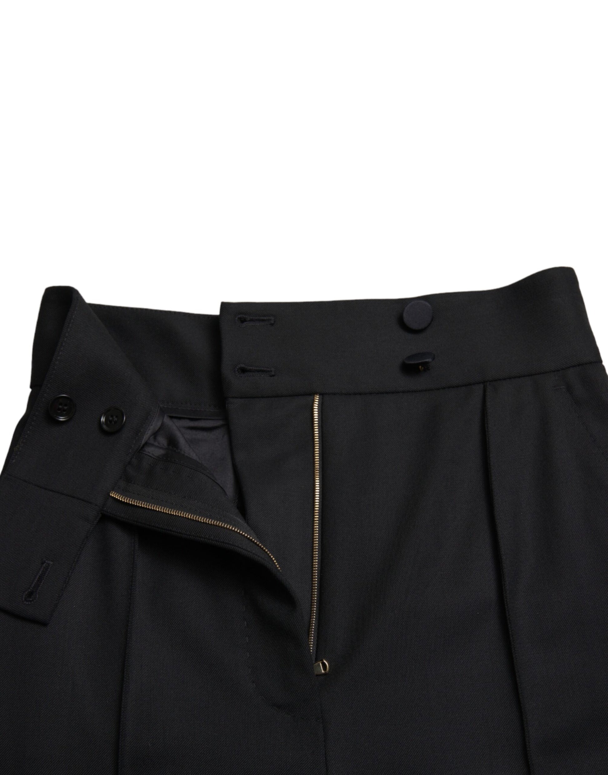 Pair of black trousers with zippered front closure