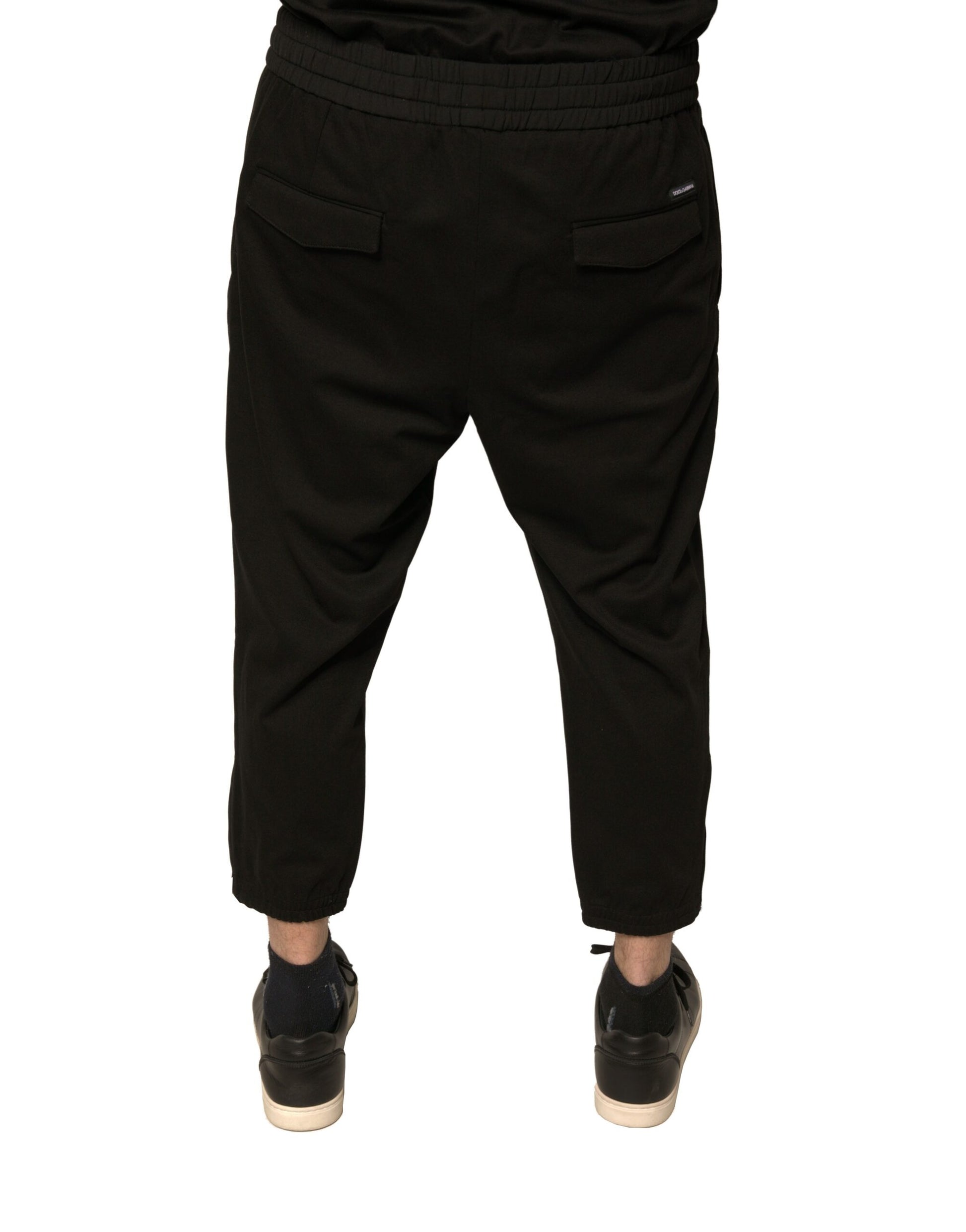 Pair of black sweatpants with pockets on sides