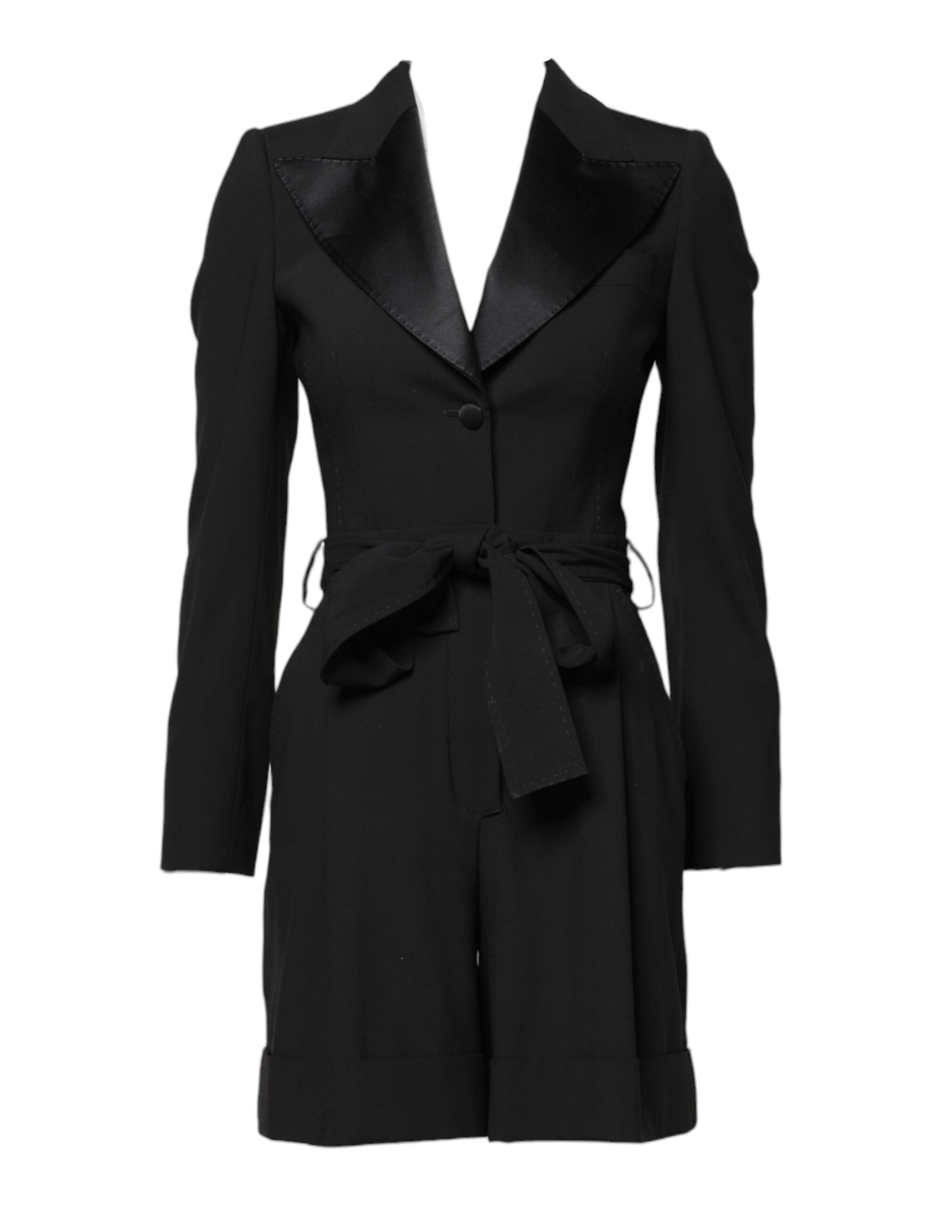 A black wool jumpsuit dress with a belted waist and tie detail