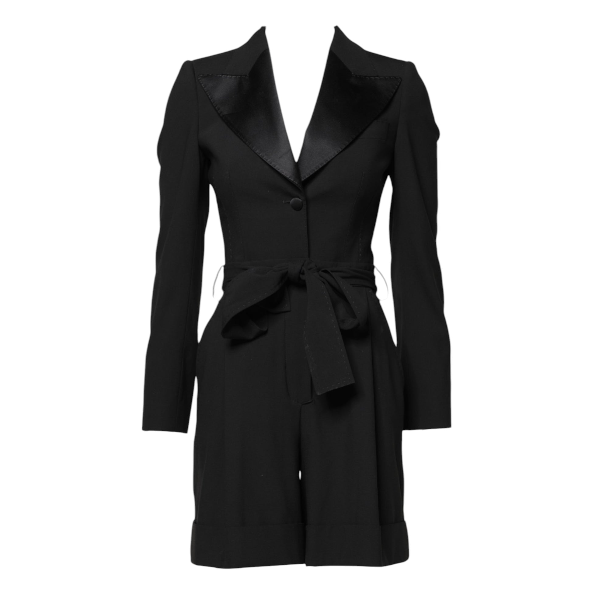 A black wool jumpsuit dress with a high neck and belted waist
