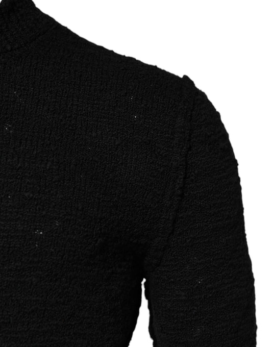 Black knit sweater on mannequin