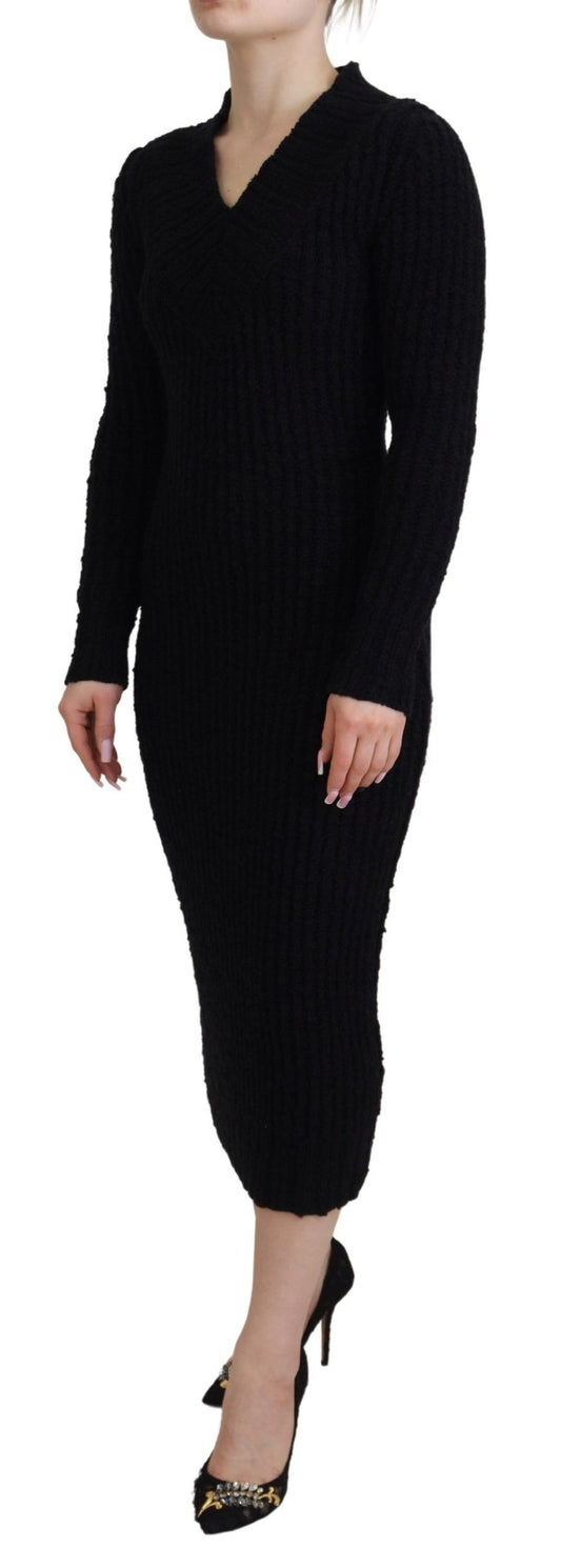 Woman wearing black pants and heels