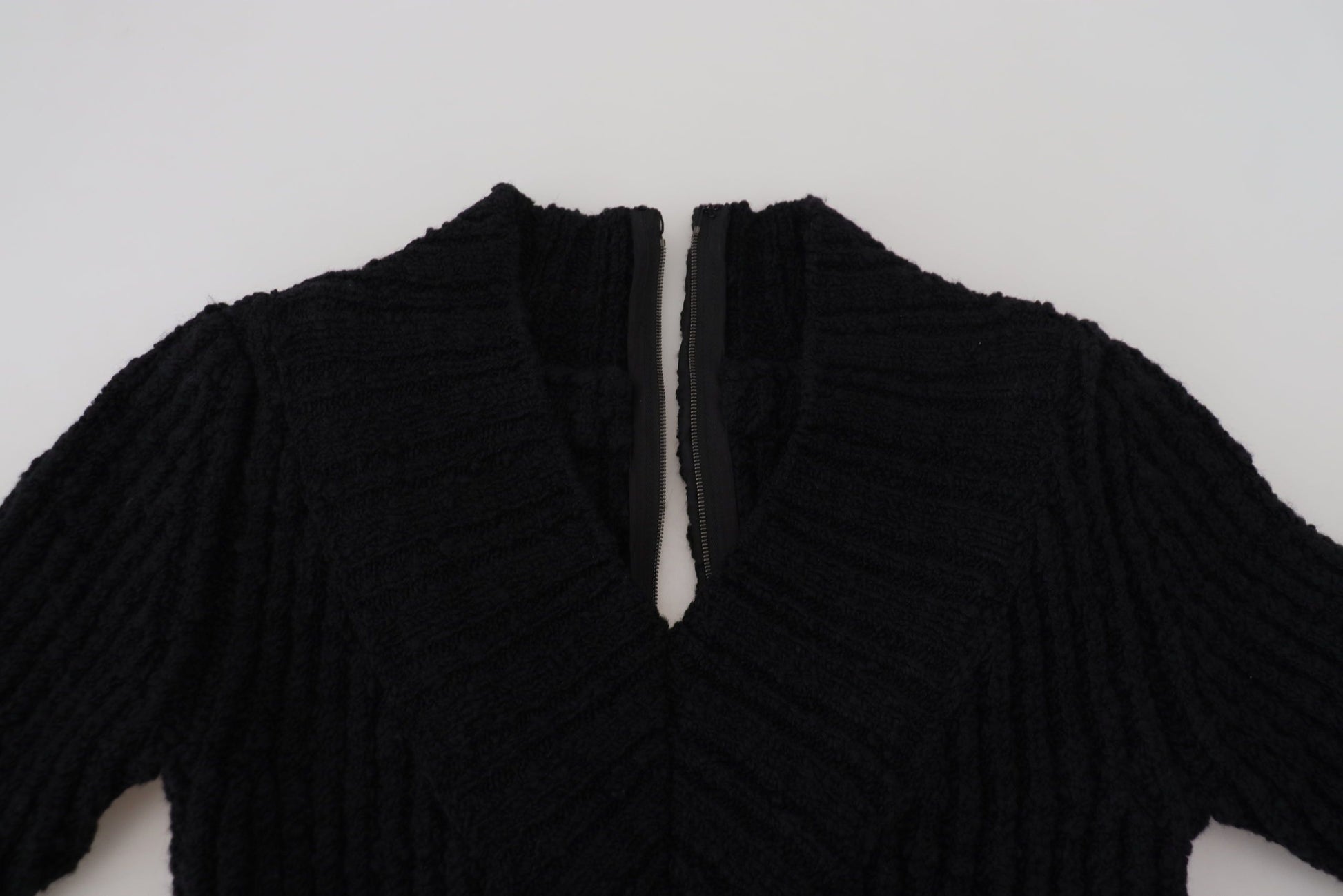 Black knitted sweater with zipper in front