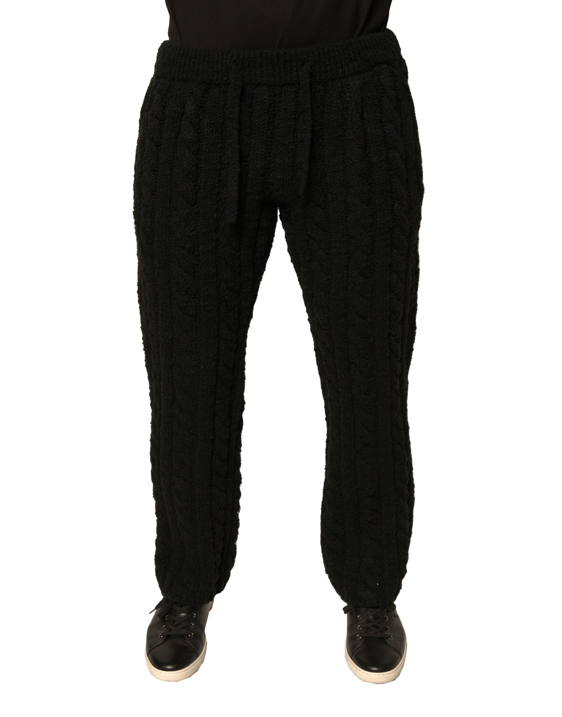 Black sweatpants with white stripes on sides
