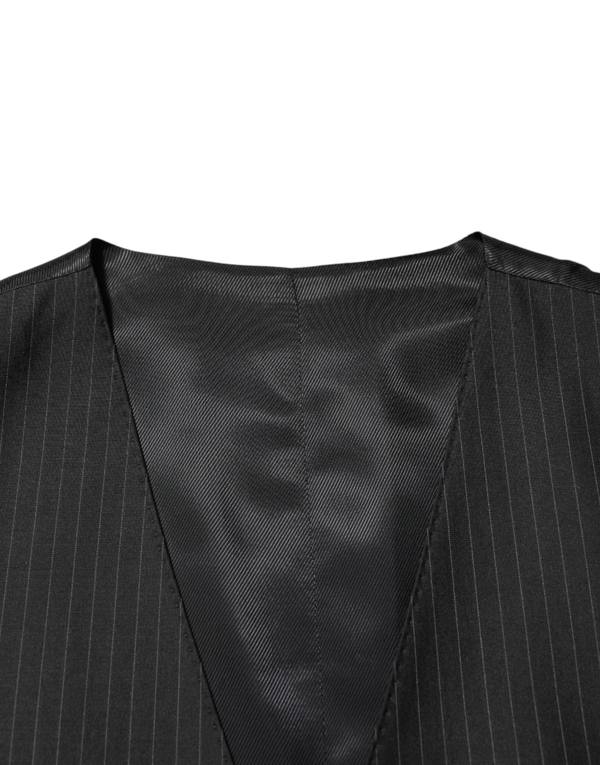 A black wool vest with a textured pattern, part of a formal men's suit