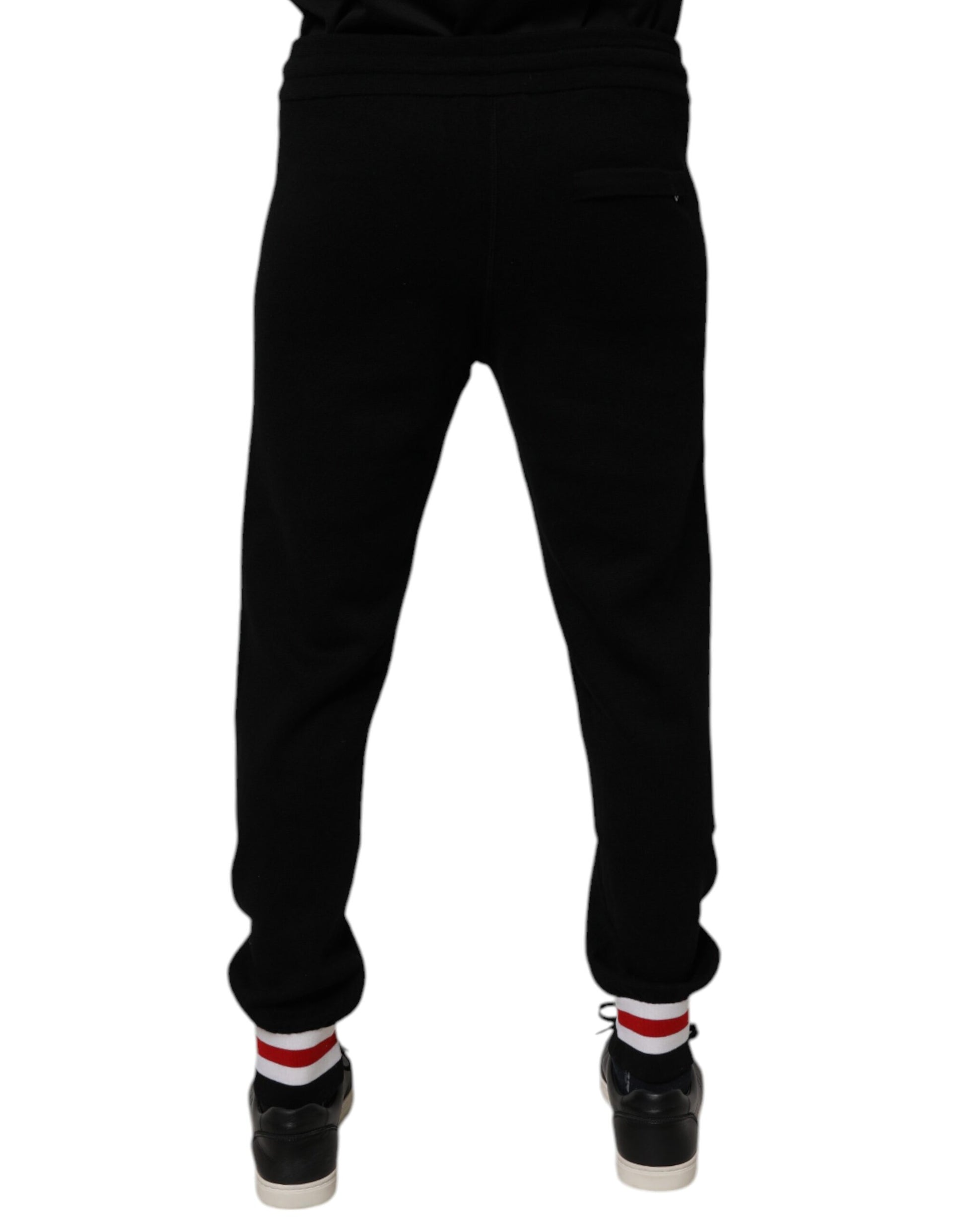 Black sweatpants with white stripe on side