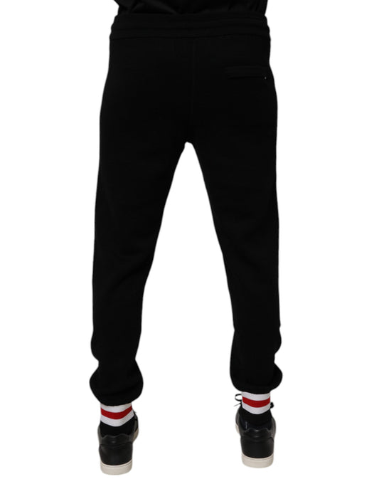 Black sweatpants with white stripe on side
