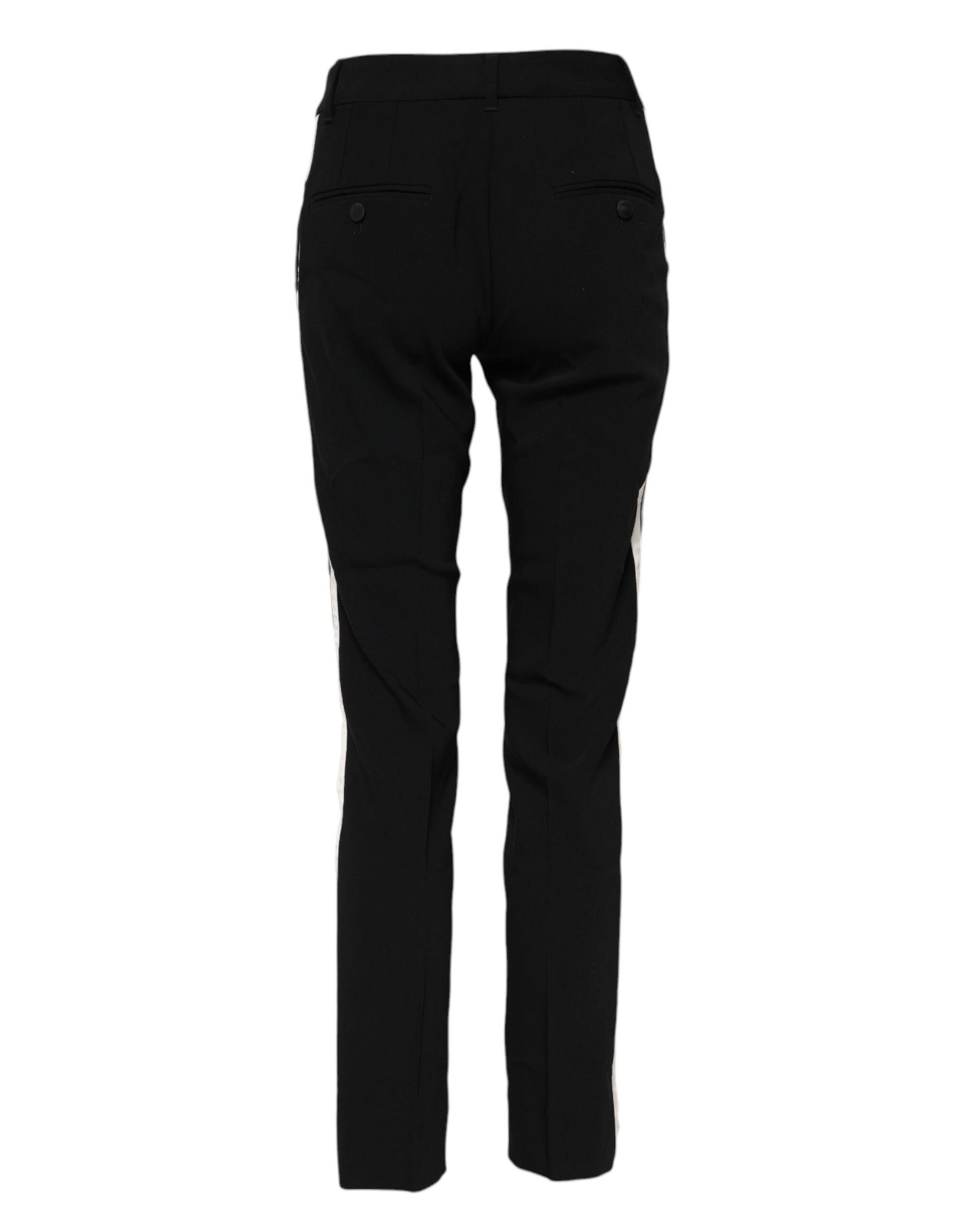 A pair of black wool mid waisted tapered dress pants by Dolce & Gabbana