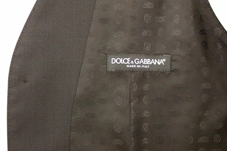 A black wool silk dress gilet jacket vest with a label that reads "Dolce & Gabbana"