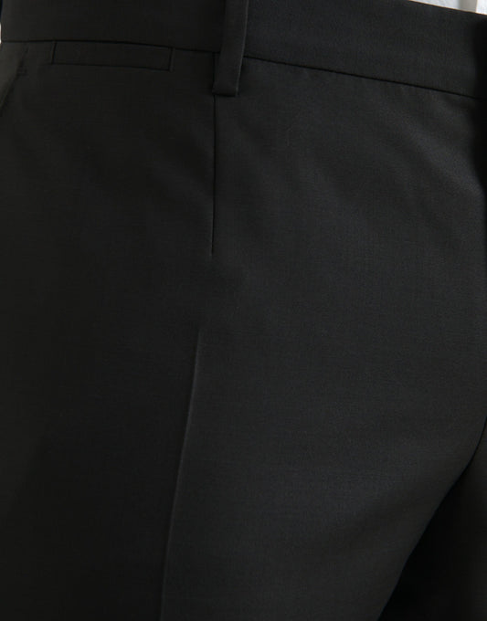 A pair of black wool silk skinny dress pants by Dolce & Gabbana