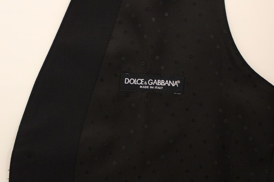 A black vest with a wool and silk blend, featuring the Dolce & Gabbana logo