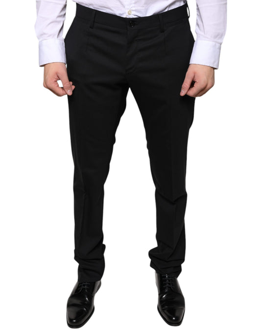 A pair of black wool skinny dress pants from the brand Dolce & Gabbana. They are designed for formal wear and