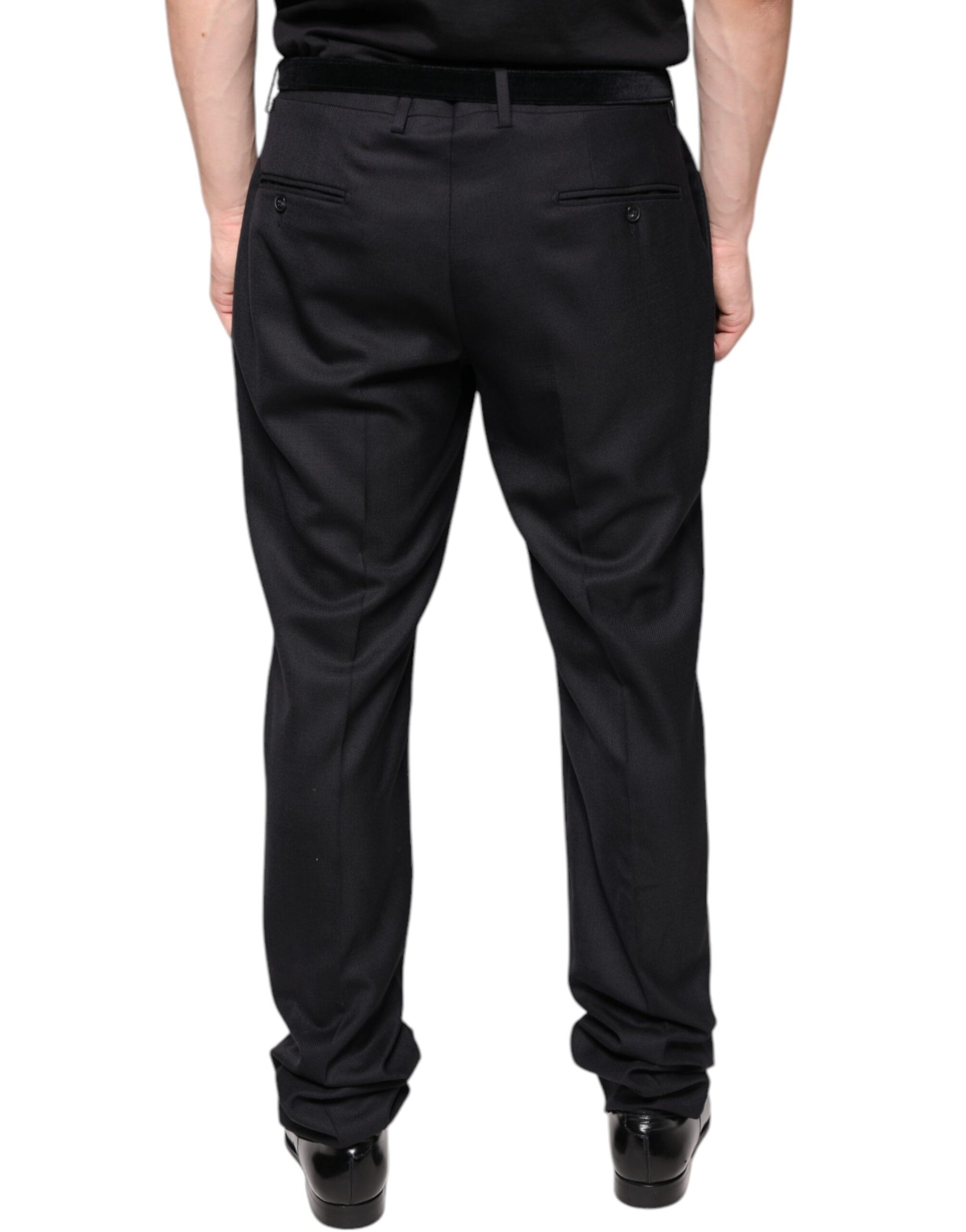 A pair of black wool skinny dress pants from the brand Dolce & Gabbana. They are designed for formal wear and