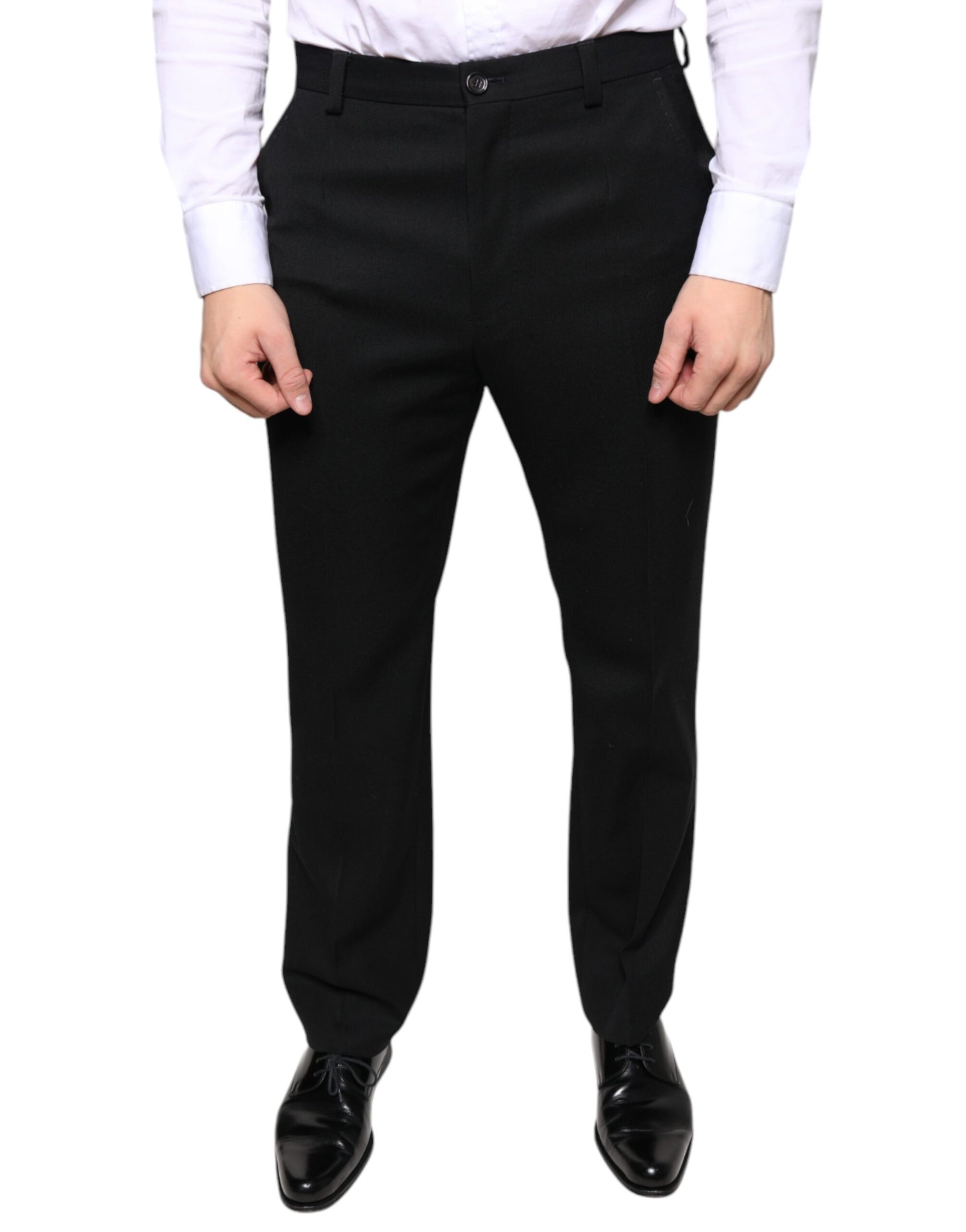 A pair of black wool skinny dress pants by Dolce & Gabbana for men