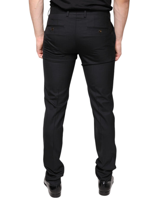 A pair of black wool skinny dress pants by Dolce & Gabbana, featuring a slim fit and visible branding