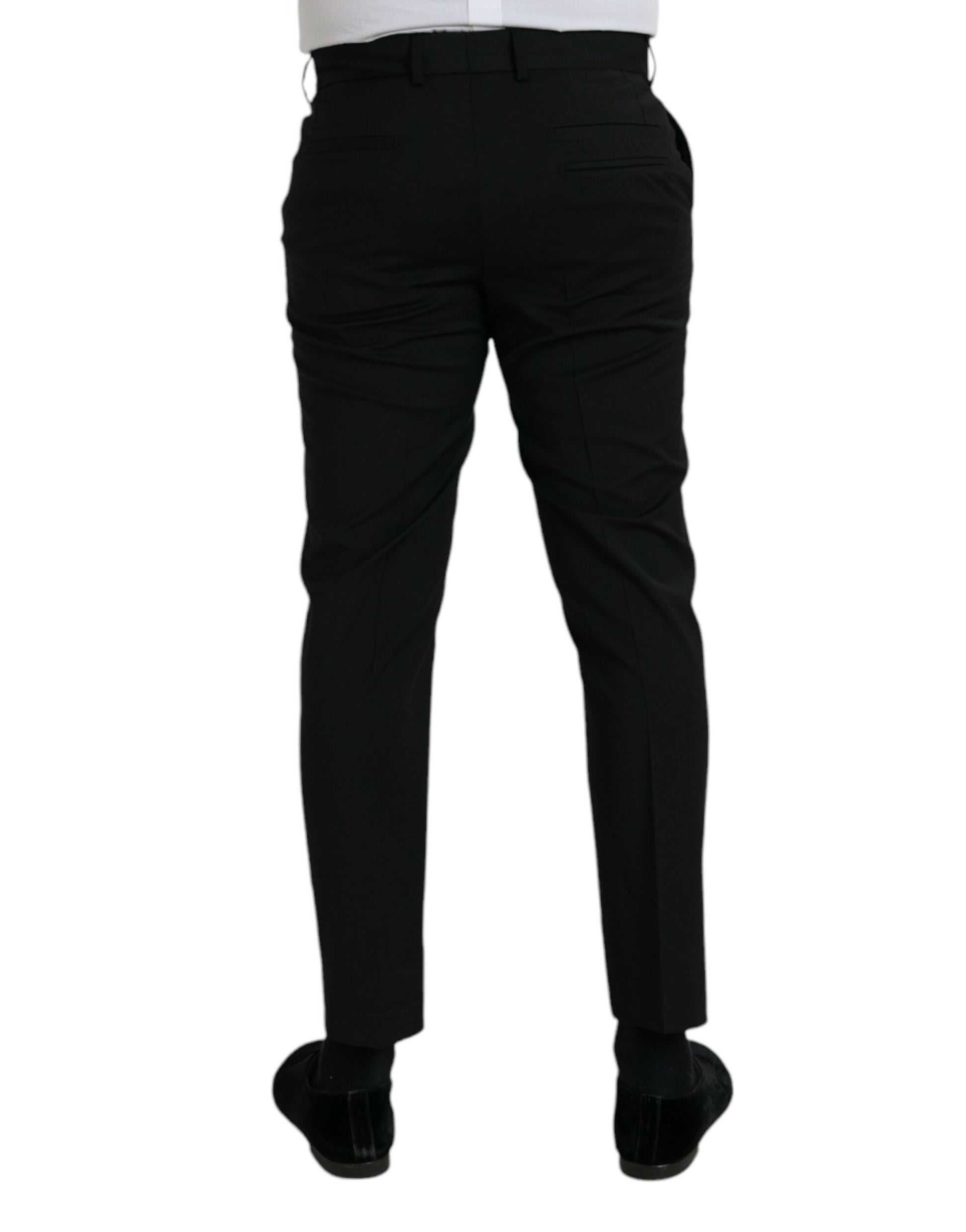 A pair of black wool slim fit dress pants by Dolce & Gabbana