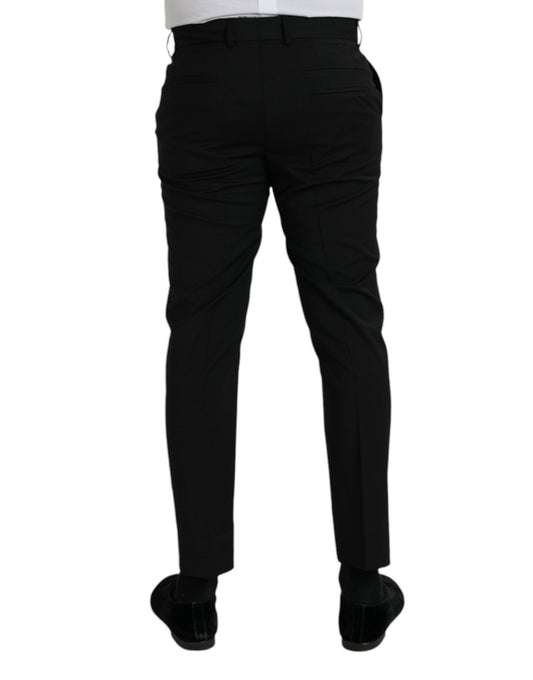 A pair of black wool slim fit dress pants by Dolce & Gabbana