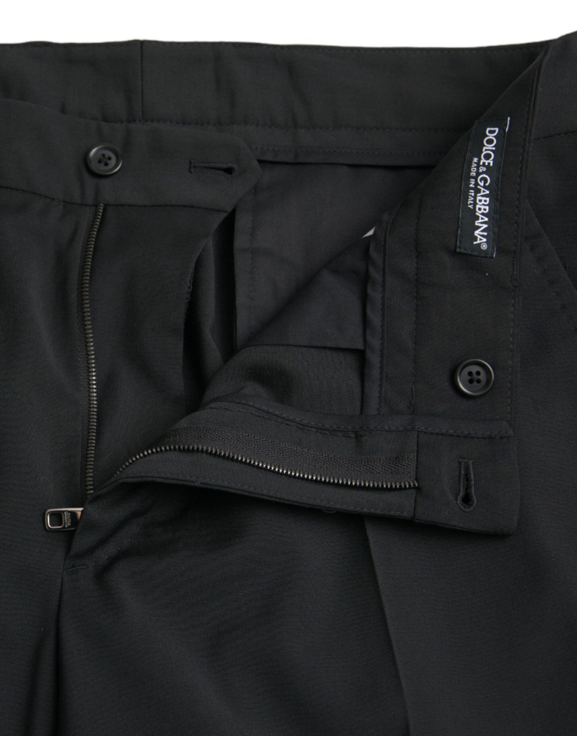 A pair of black wool slim-fit dress pants from Dolce & Gabbana