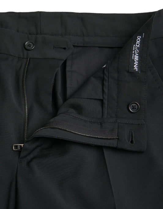 A pair of black wool slim-fit dress pants from Dolce & Gabbana