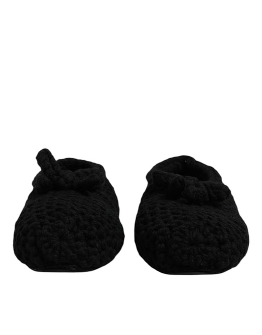 Pair of black slippers