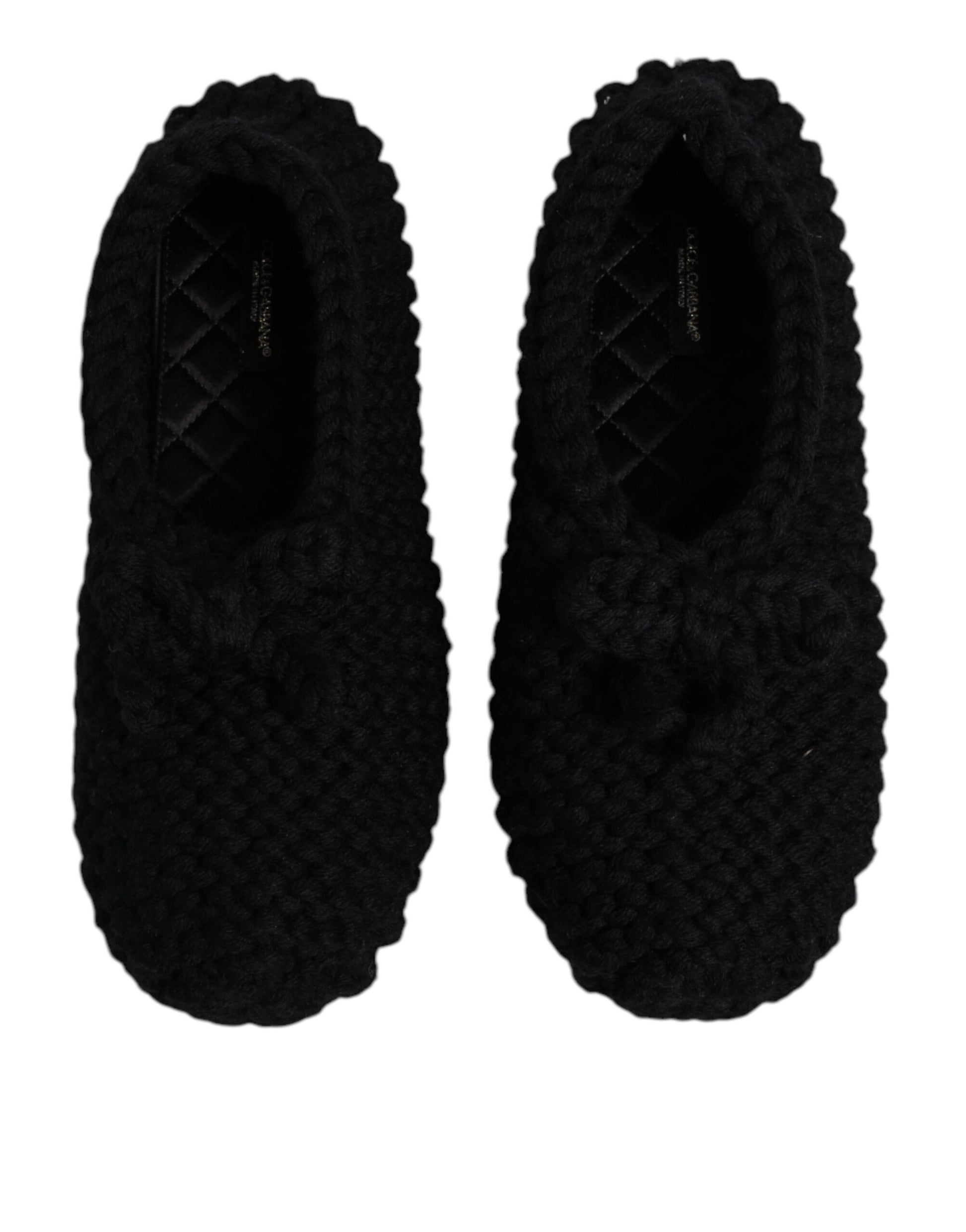 Pair of black slippers with fur trim