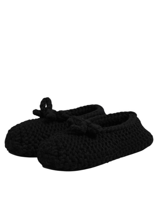 Black flip flops on white background