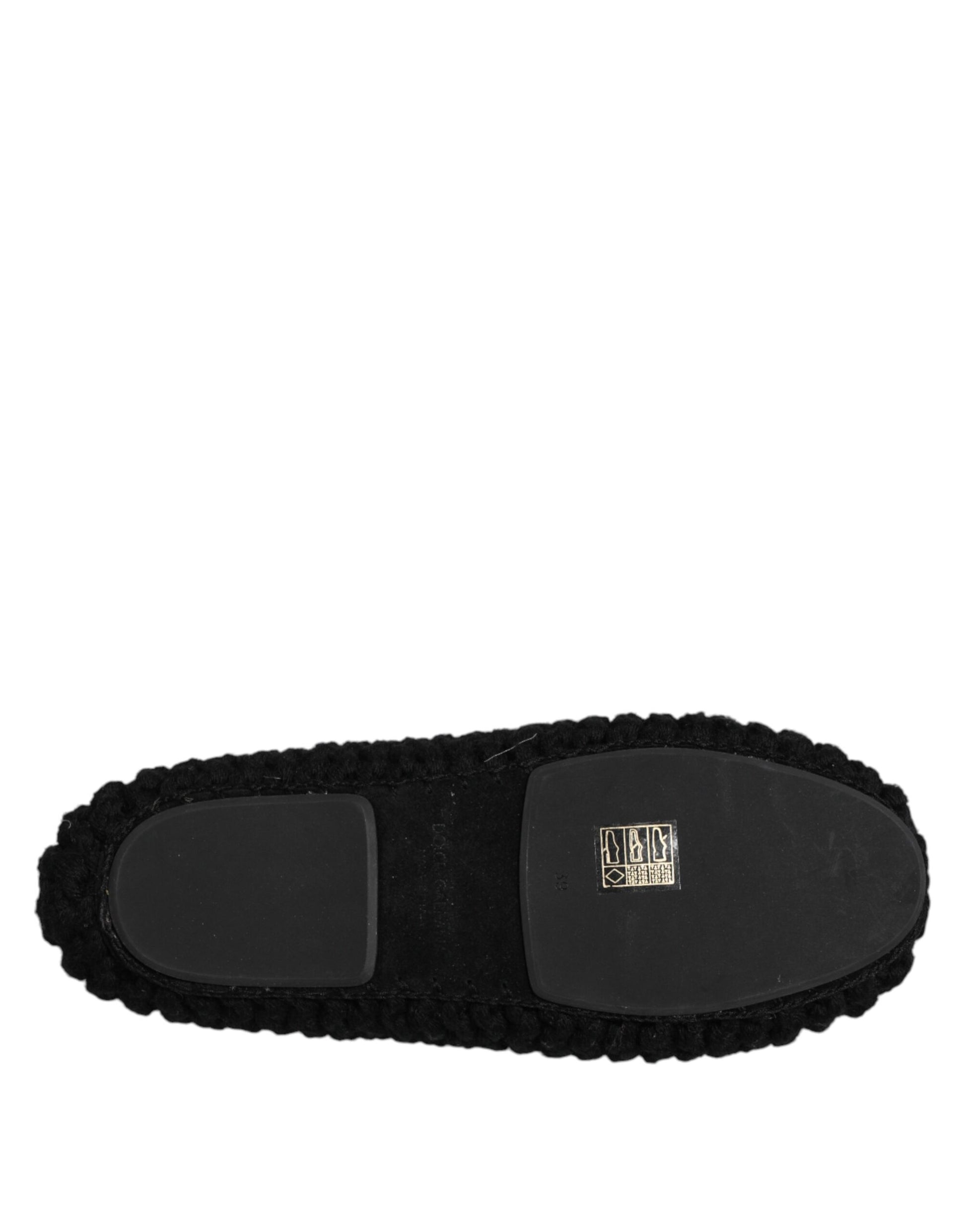 Black slipper with a furry texture on the inside