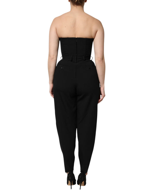 A black wool strapless romper jumpsuit dress with a fitted waist and high-rise pants