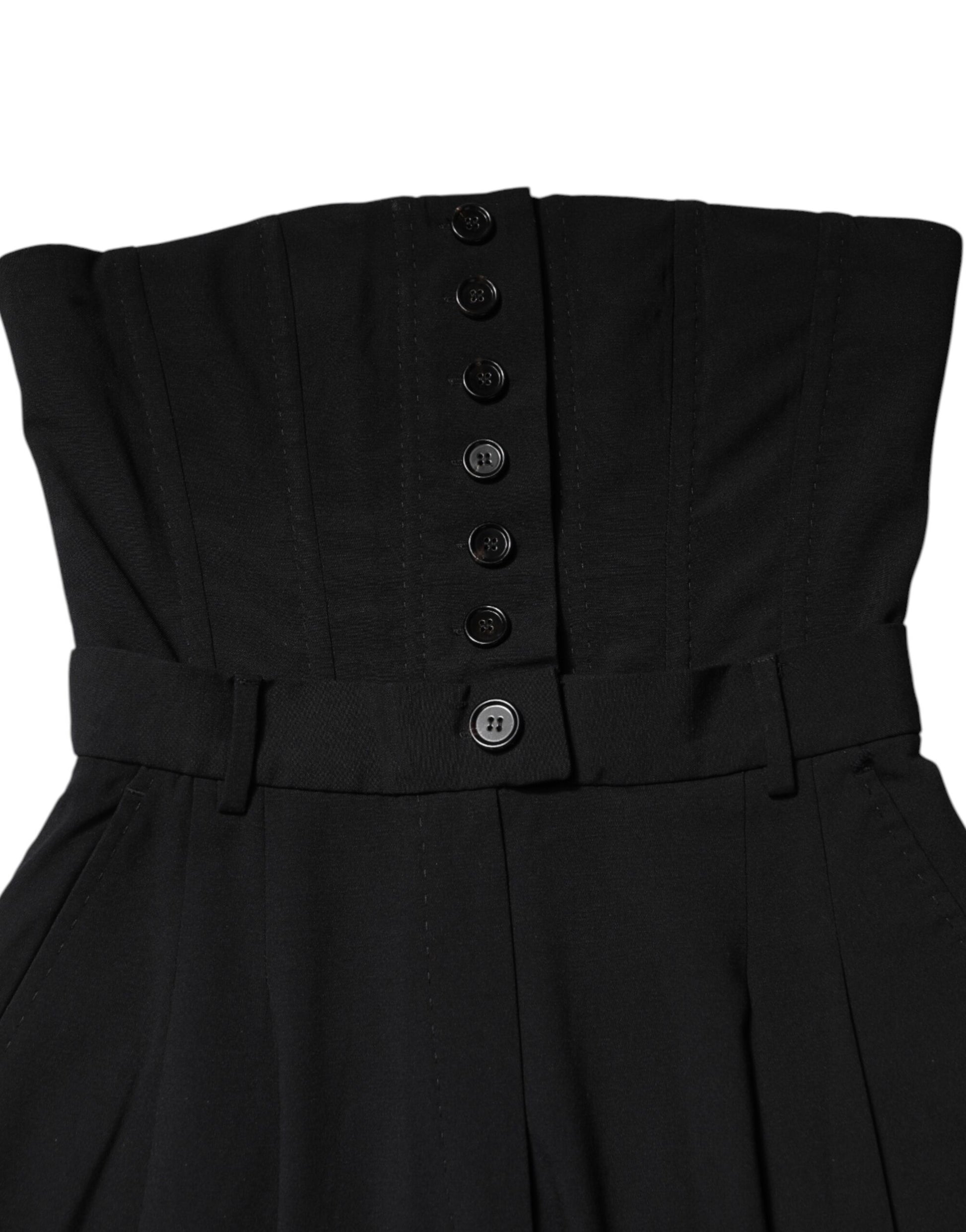 A black wool strapless romper jumpsuit dress with buttons and a belt