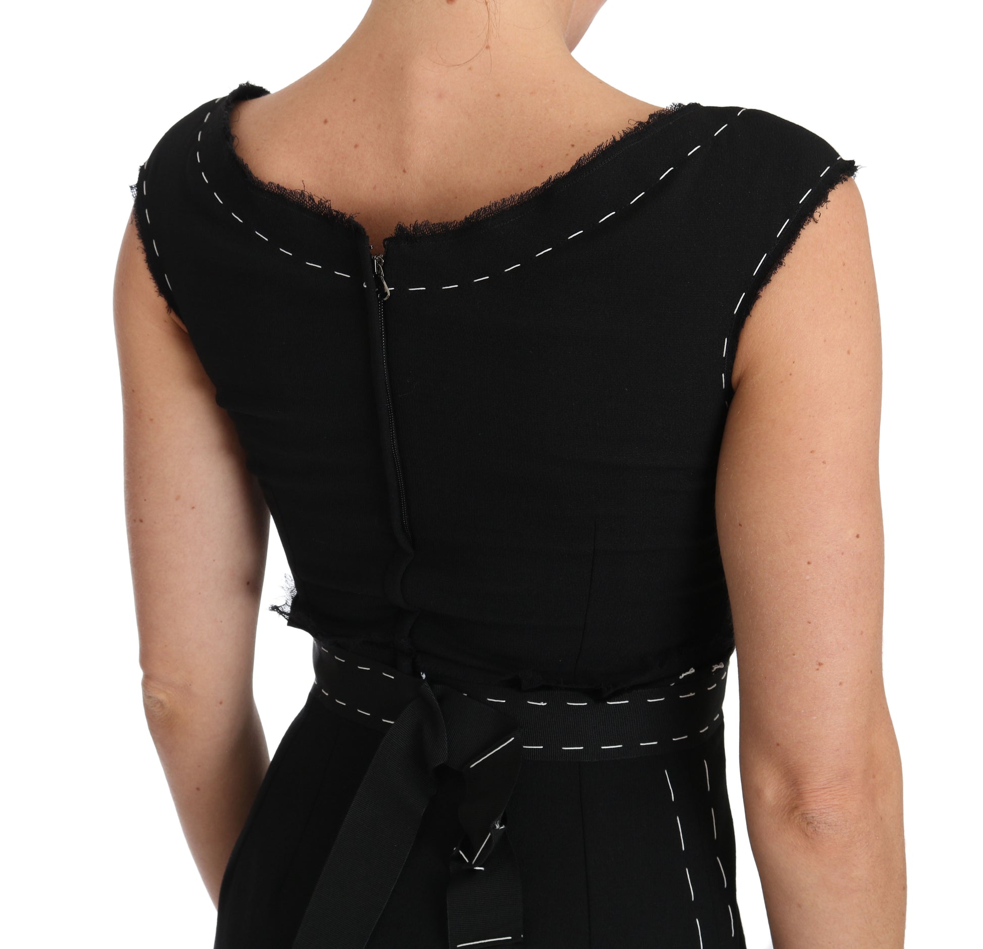 A black wool stretch A-line sheath dress with a V-neck and short sleeves