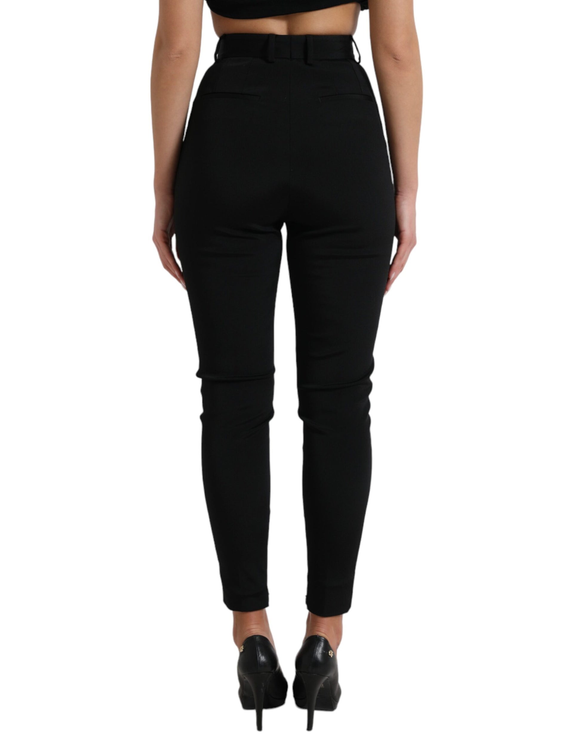 Black pants with high waist and zipper detail on back