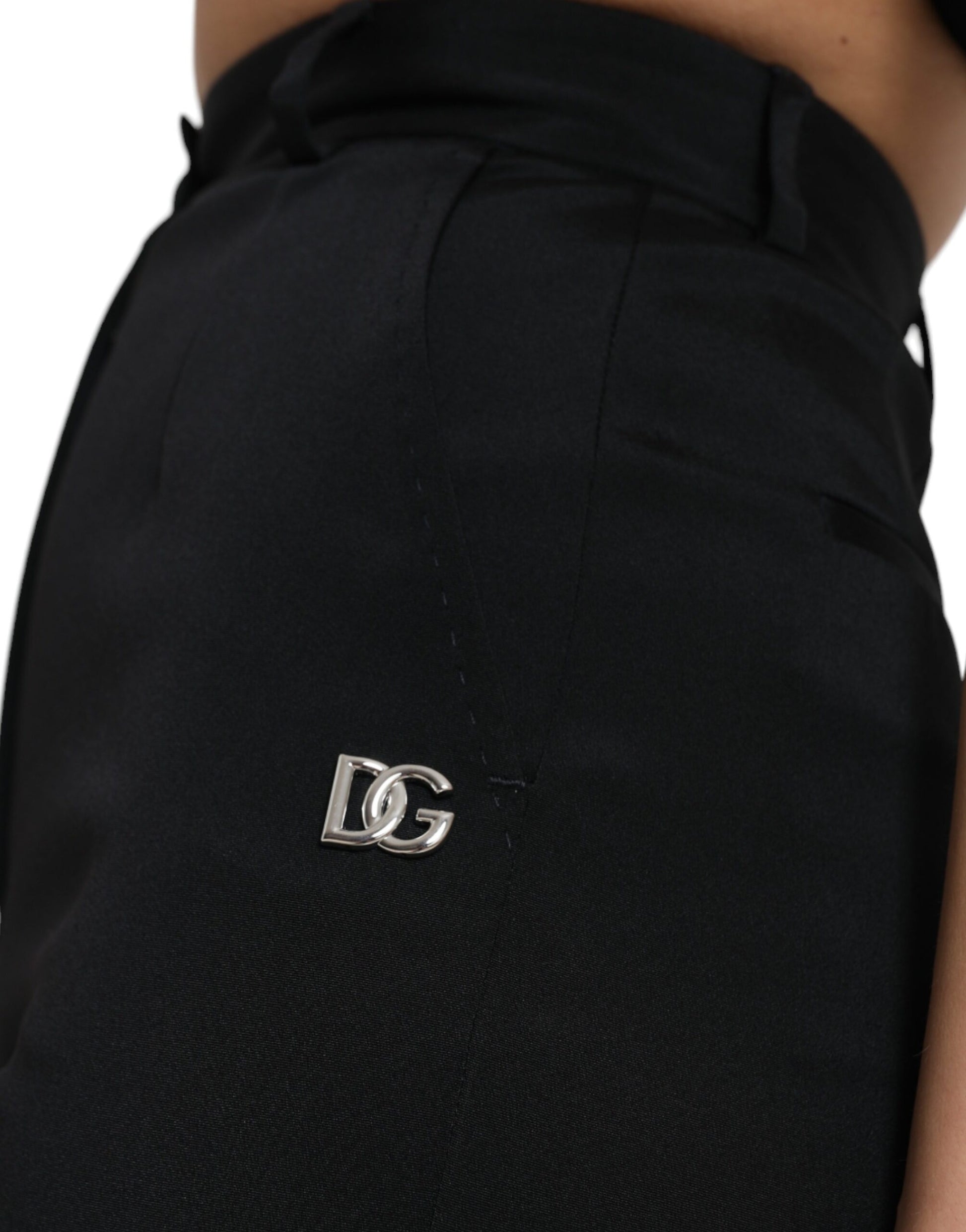 Black skirt with a small silver logo on the side