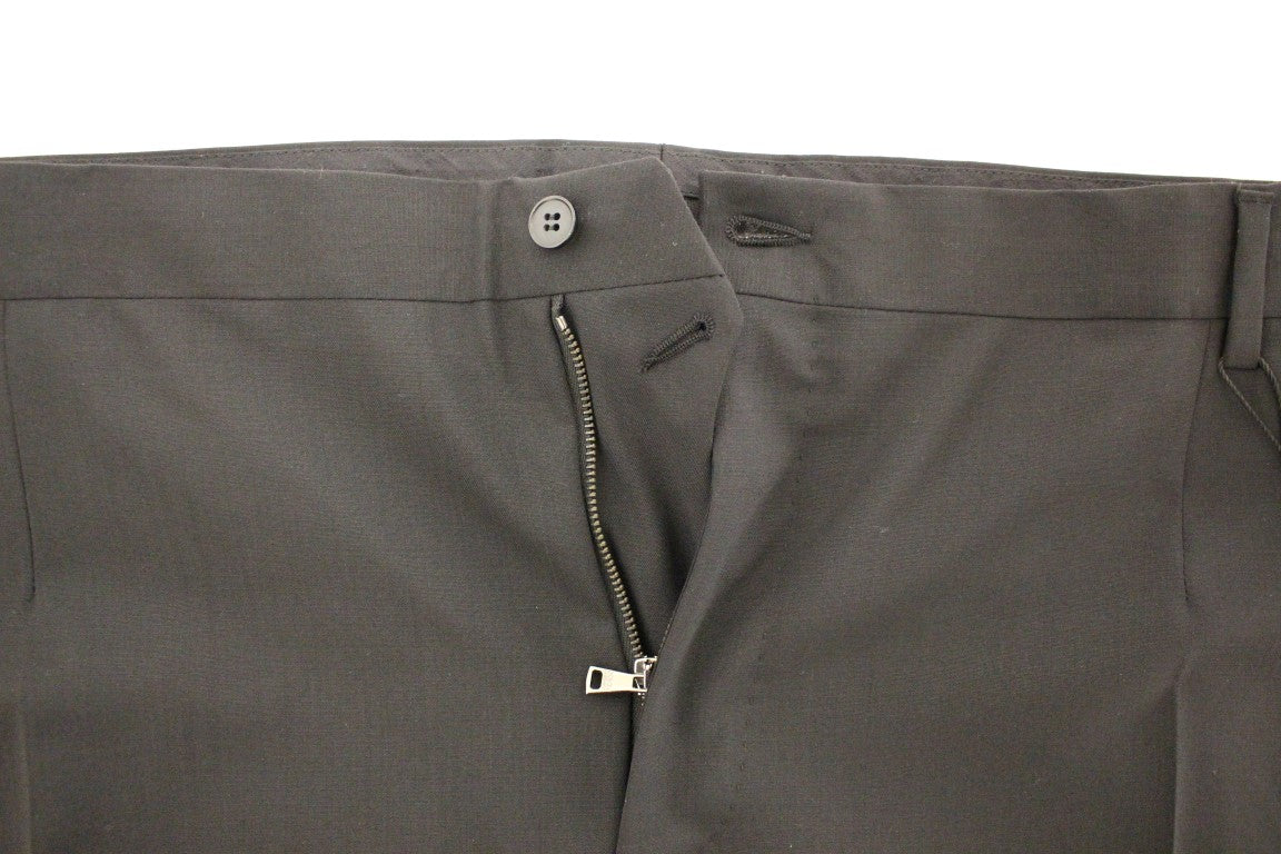 Pair of grey trousers with zippered front closure