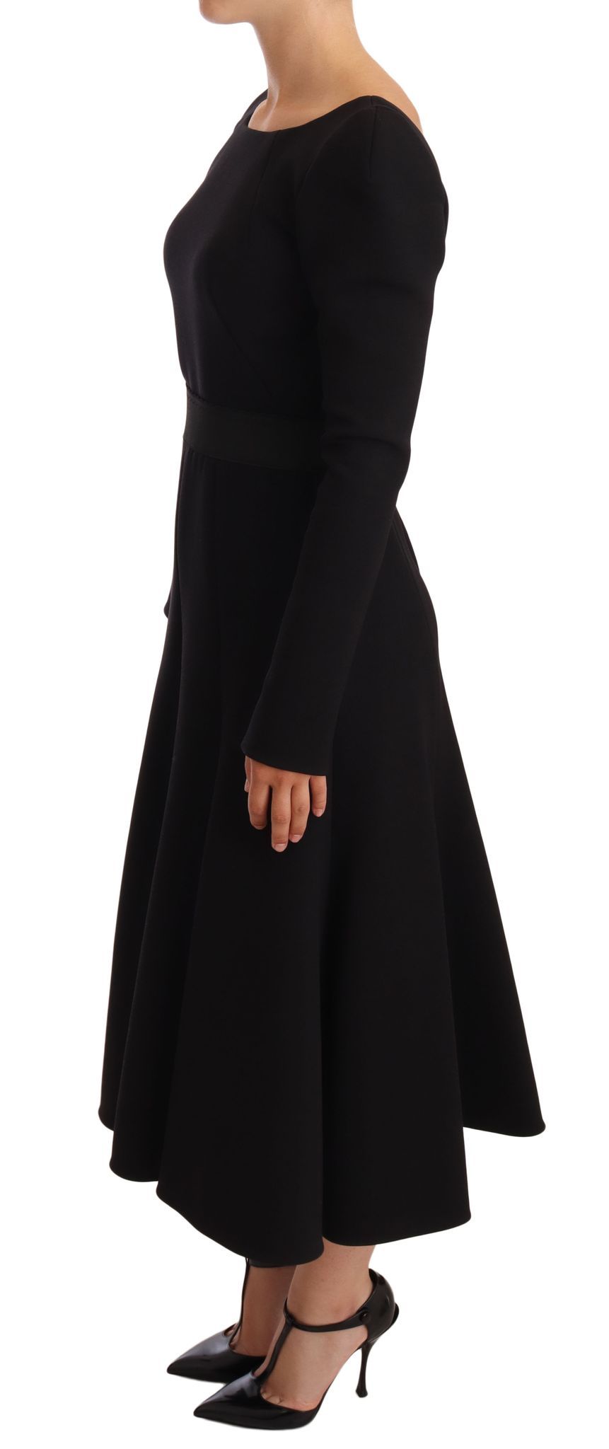A black wool stretch sheath dress with open back and high heels