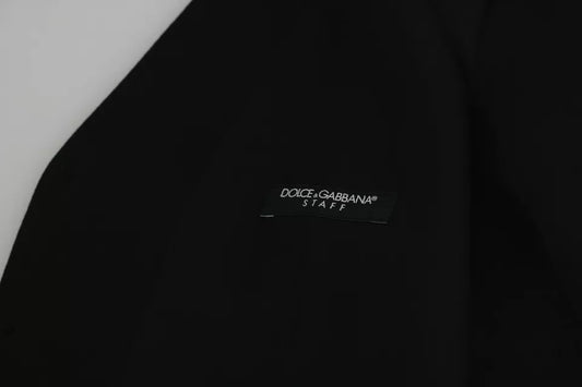 A black wool vest with a stretch waistband, featuring the Dolce & Gabbana logo
