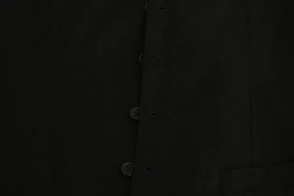 A black wool vest with stretch waistband, part of a formal dress suit