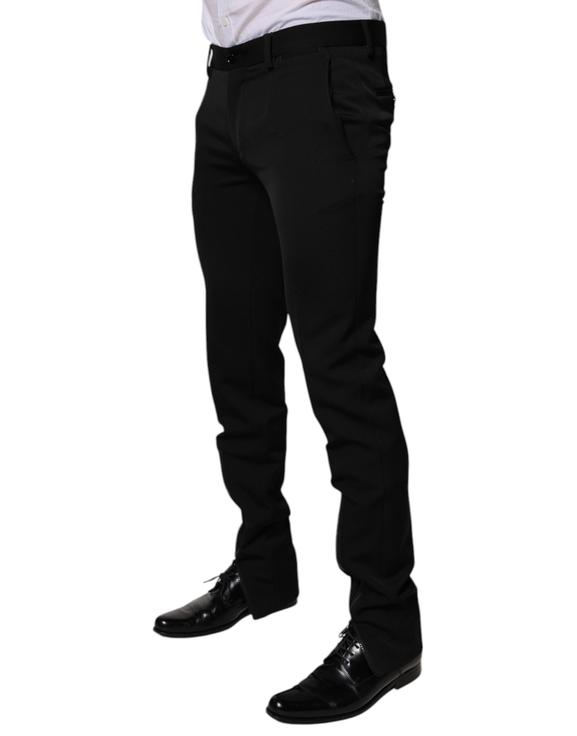A pair of black wool tapered formal dress pants by Dolce & Gabbana