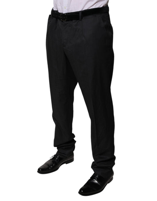 A pair of black wool tapered formal dress pants from the brand Dolce & Gabbana