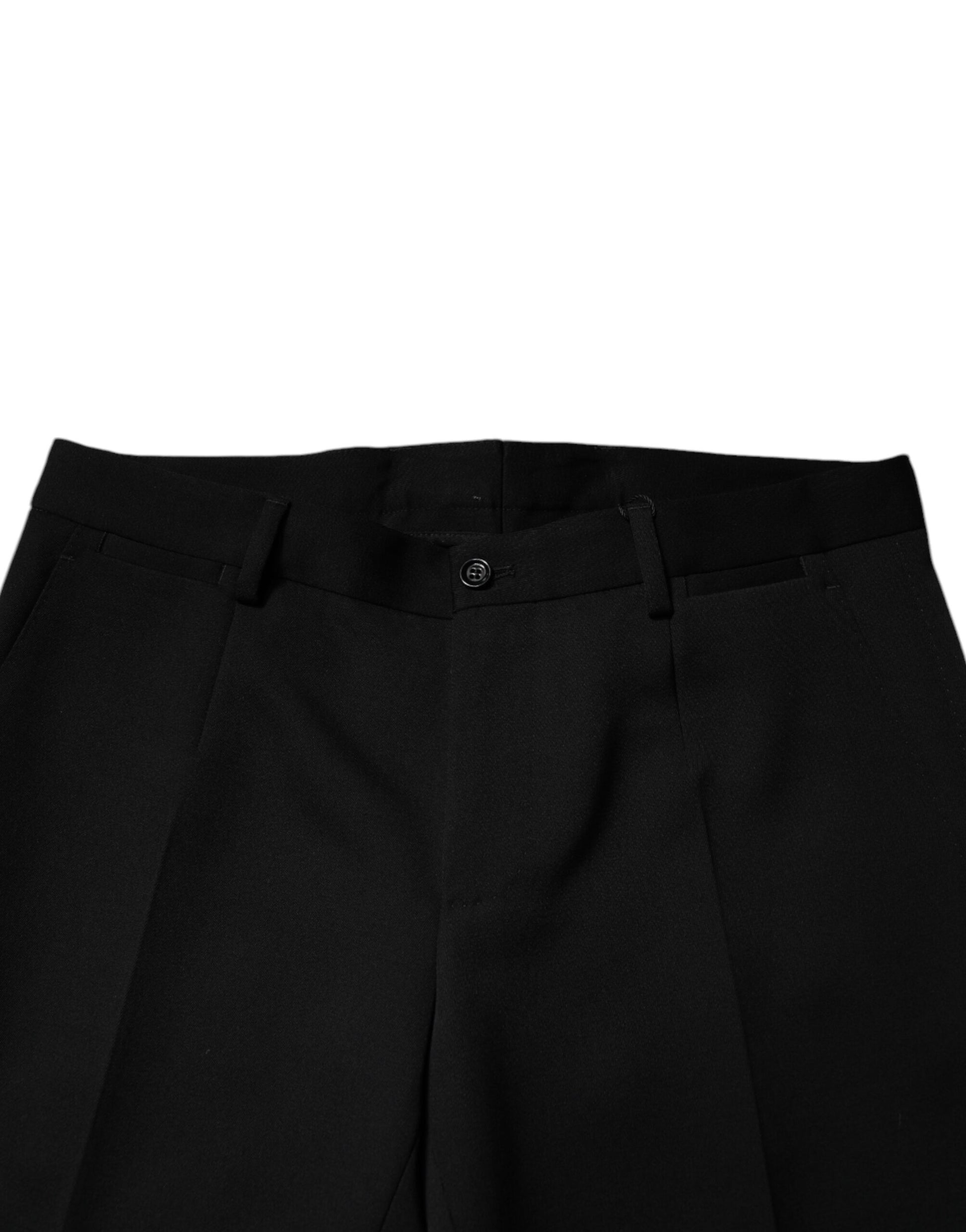 A pair of black wool tapered formal dress pants from the brand Dolce & Gabbana